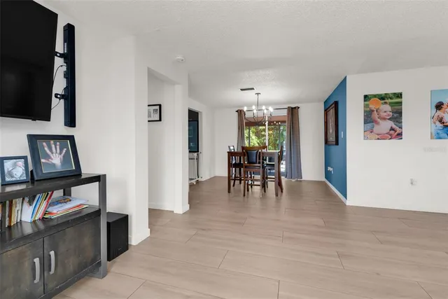 a view of livingroom with furniture and workspace