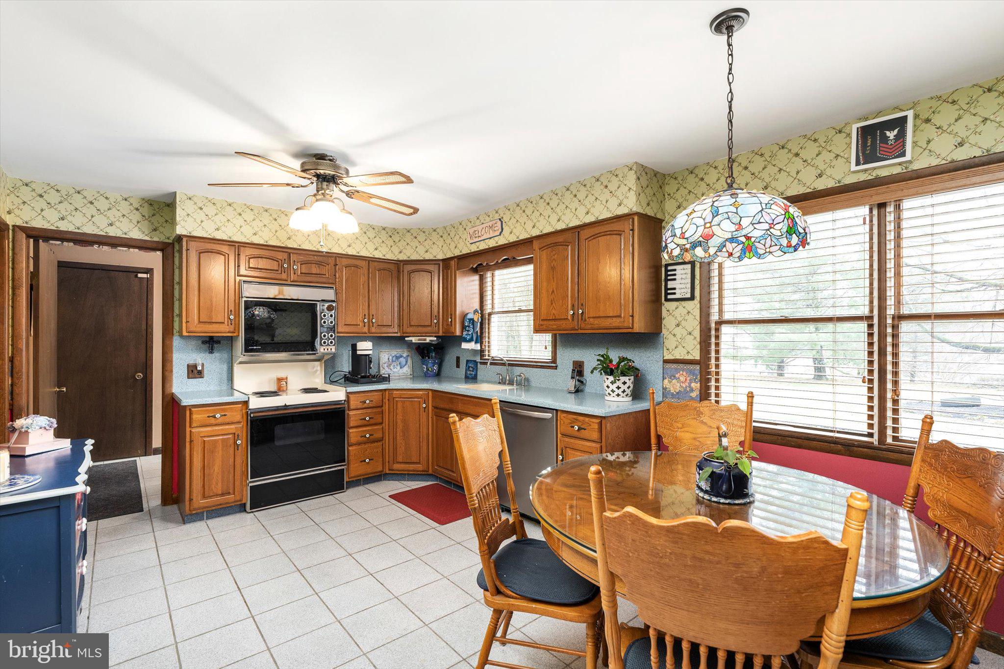 3 Eleanor Drive Wrightstown, NJ 08562 - Photo 11 of 28 a view of a dining room with furniture window and wooden floor