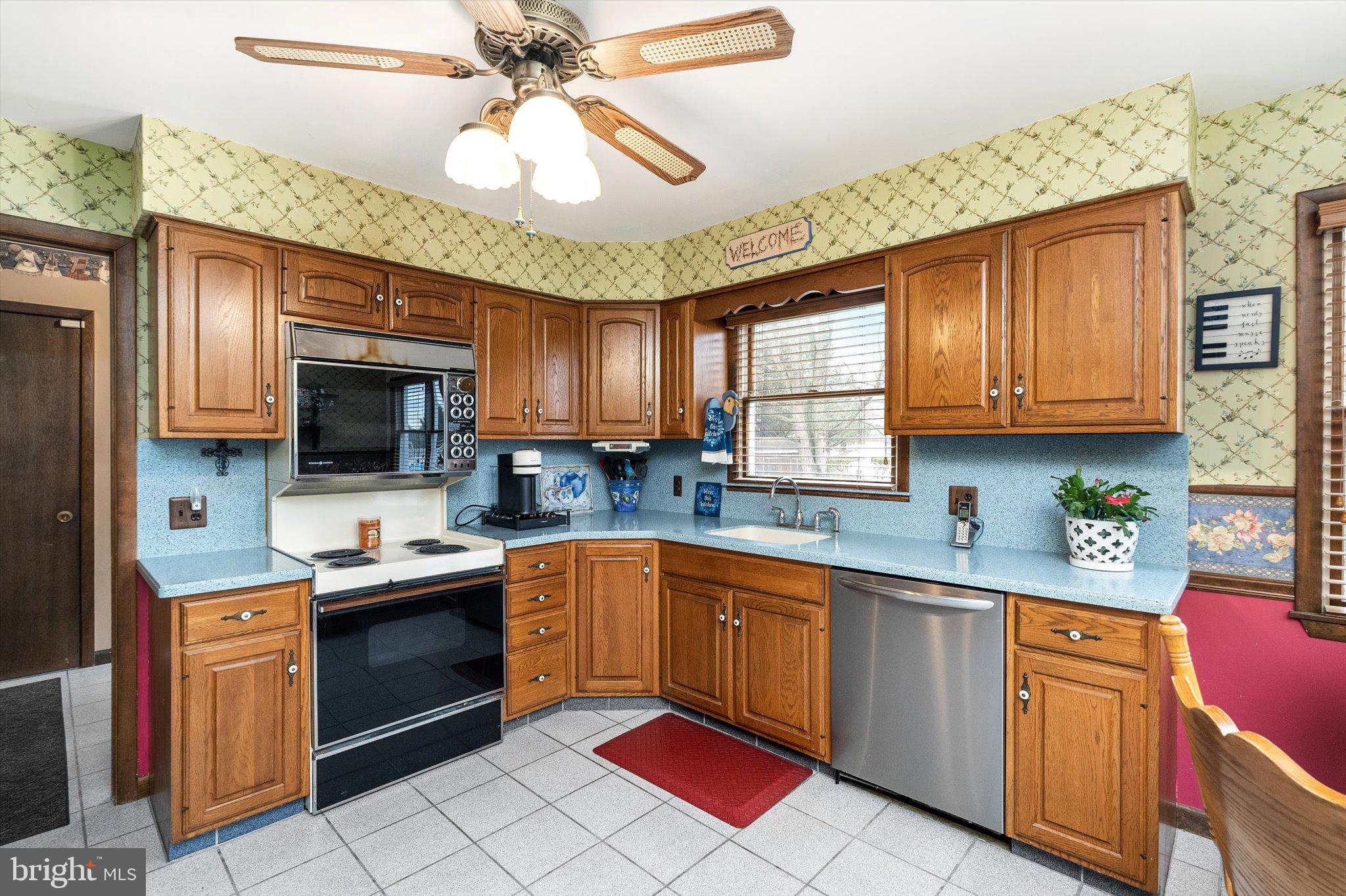 3 Eleanor Drive Wrightstown, NJ 08562 - Photo 12 of 28 a kitchen with stainless steel appliances granite countertop a sink dishwasher stove top oven and cabinets