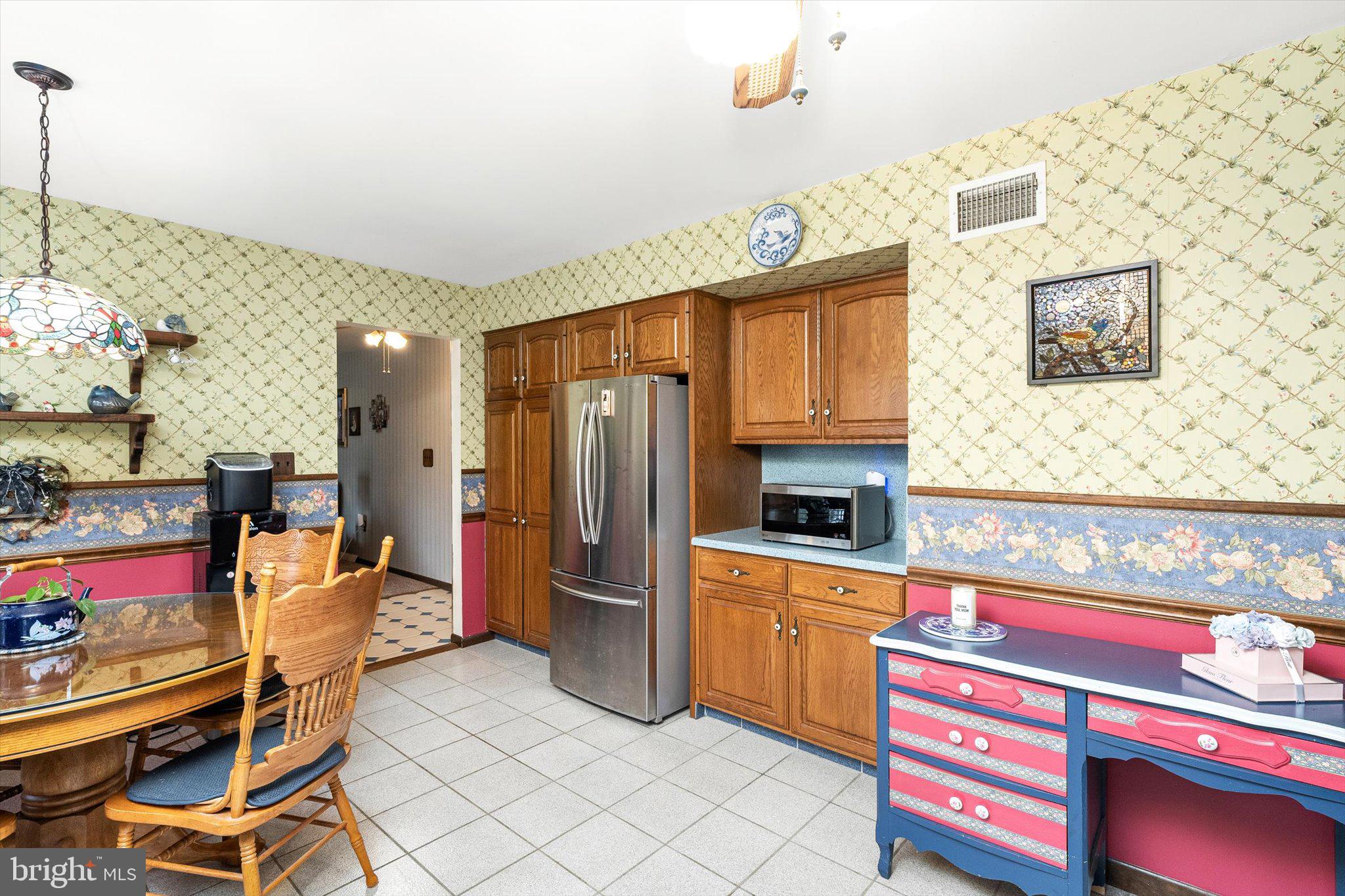 3 Eleanor Drive Wrightstown, NJ 08562 - Photo 14 of 28 a kitchen with stainless steel appliances kitchen island granite countertop a refrigerator and a stove top oven