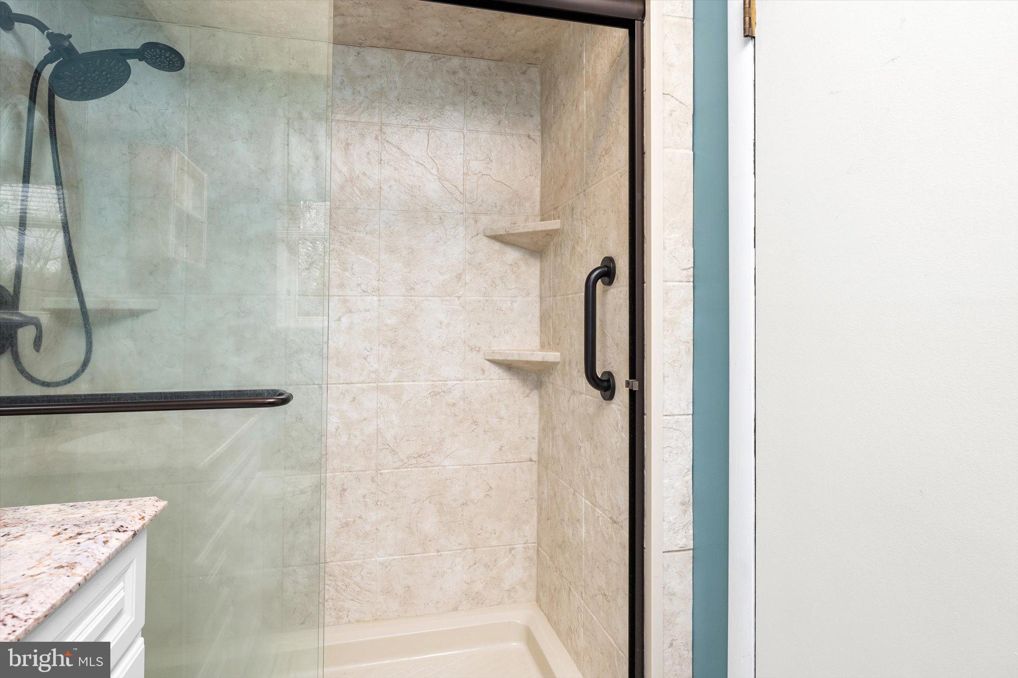 3 Eleanor Drive Wrightstown, NJ 08562 - Photo 24 of 28 a bathroom with a glass shower door