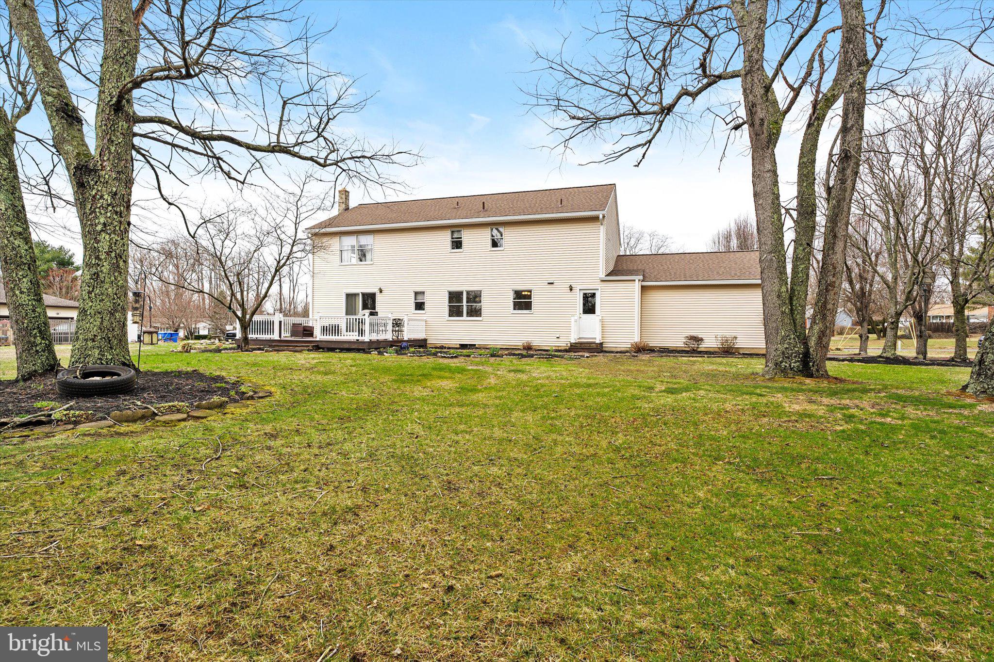 3 Eleanor Drive Wrightstown, NJ 08562 - Photo 28 of 28 a white house that has a tree in front of it