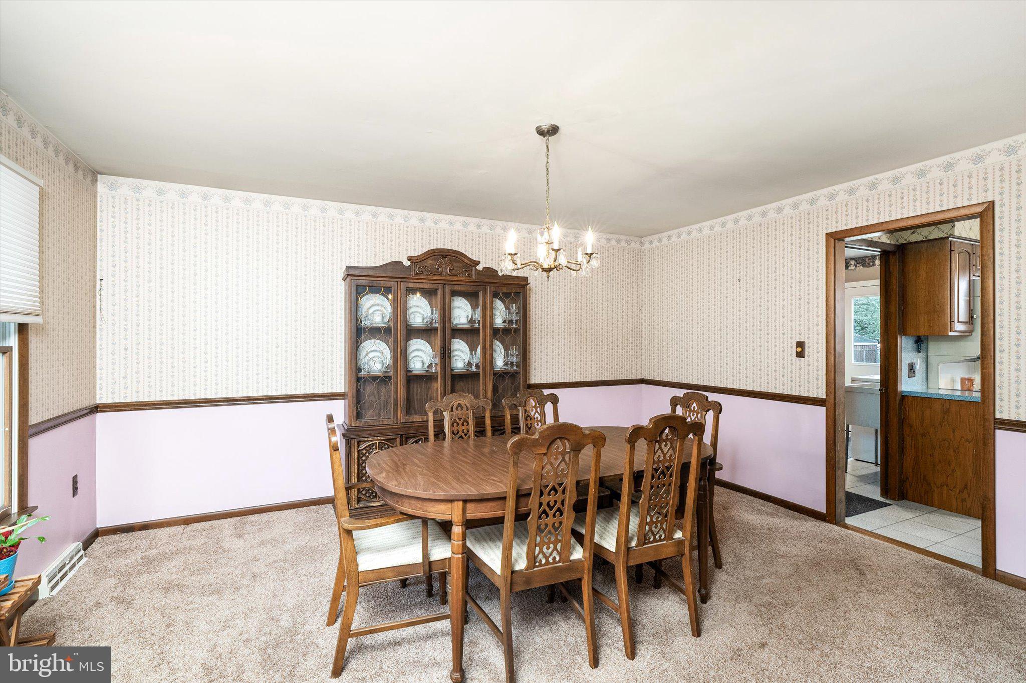 3 Eleanor Drive Wrightstown, NJ 08562 - Photo 7 of 28 a view of a dining room with furniture and chandelier
