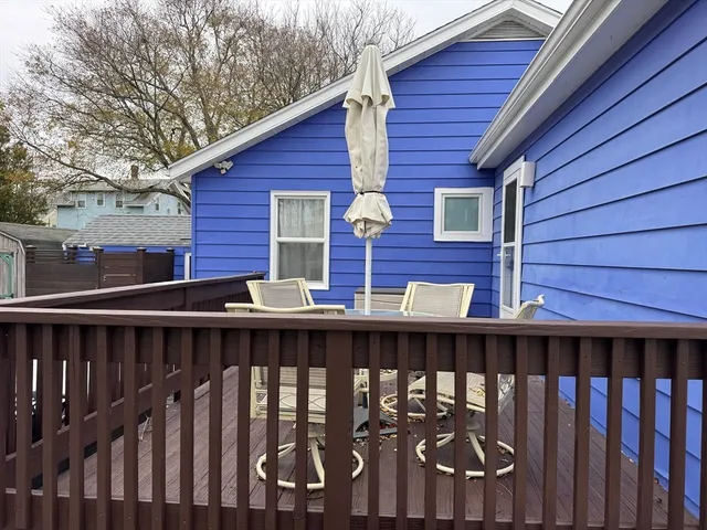 a view of wooden house and a window