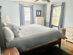 6 Hadassah Way, Unit 11/15/15 Hull, MA 02045 - Photo 5 of 12 a bedroom with a bed and a window