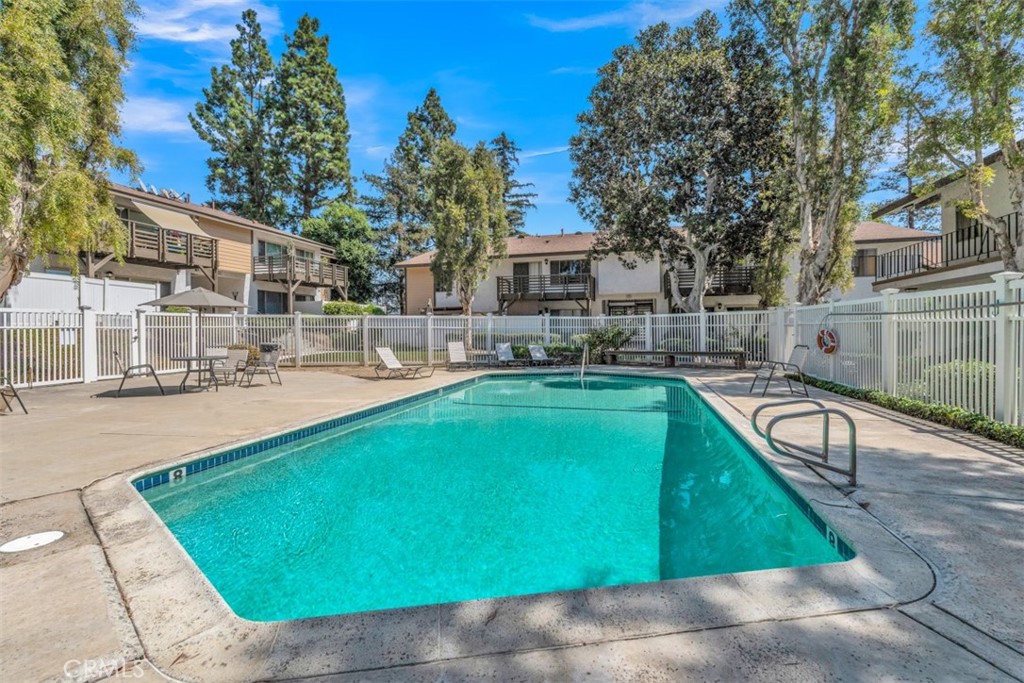 1200 West Lambert Road, Unit 41 La Habra, CA 90631 - Photo 11 of 11 a swimming pool with outdoor seating and yard