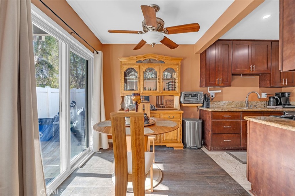 1200 West Lambert Road, Unit 41 La Habra, CA 90631 - Photo 4 of 11 a very nice looking kitchen with a large window wooden cabinets and stainless steel appliances