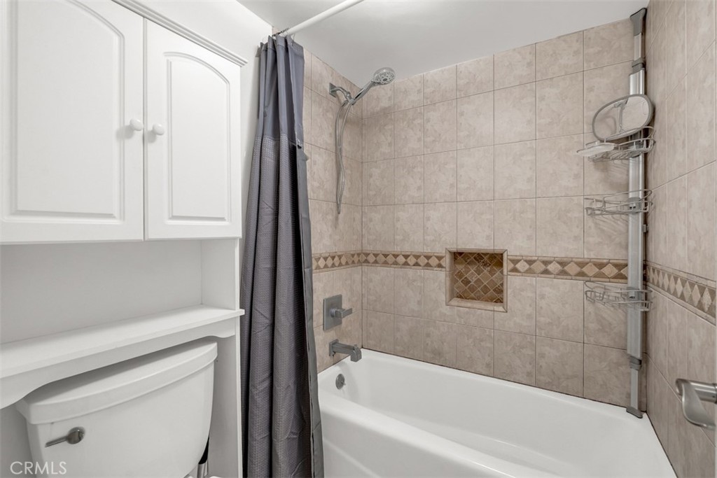 1200 West Lambert Road, Unit 41 La Habra, CA 90631 - Photo 7 of 11 a bathroom with a bathtub and a shower