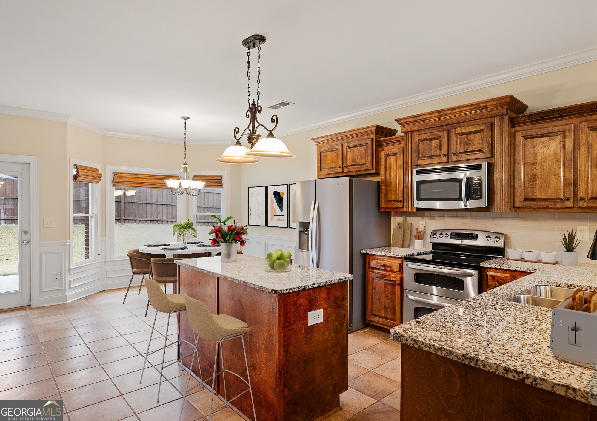 1355 Cold Tree Lane Watkinsville, GA 30677 - Photo 11 of 47 a kitchen with stainless steel appliances granite countertop a sink stove and refrigerator