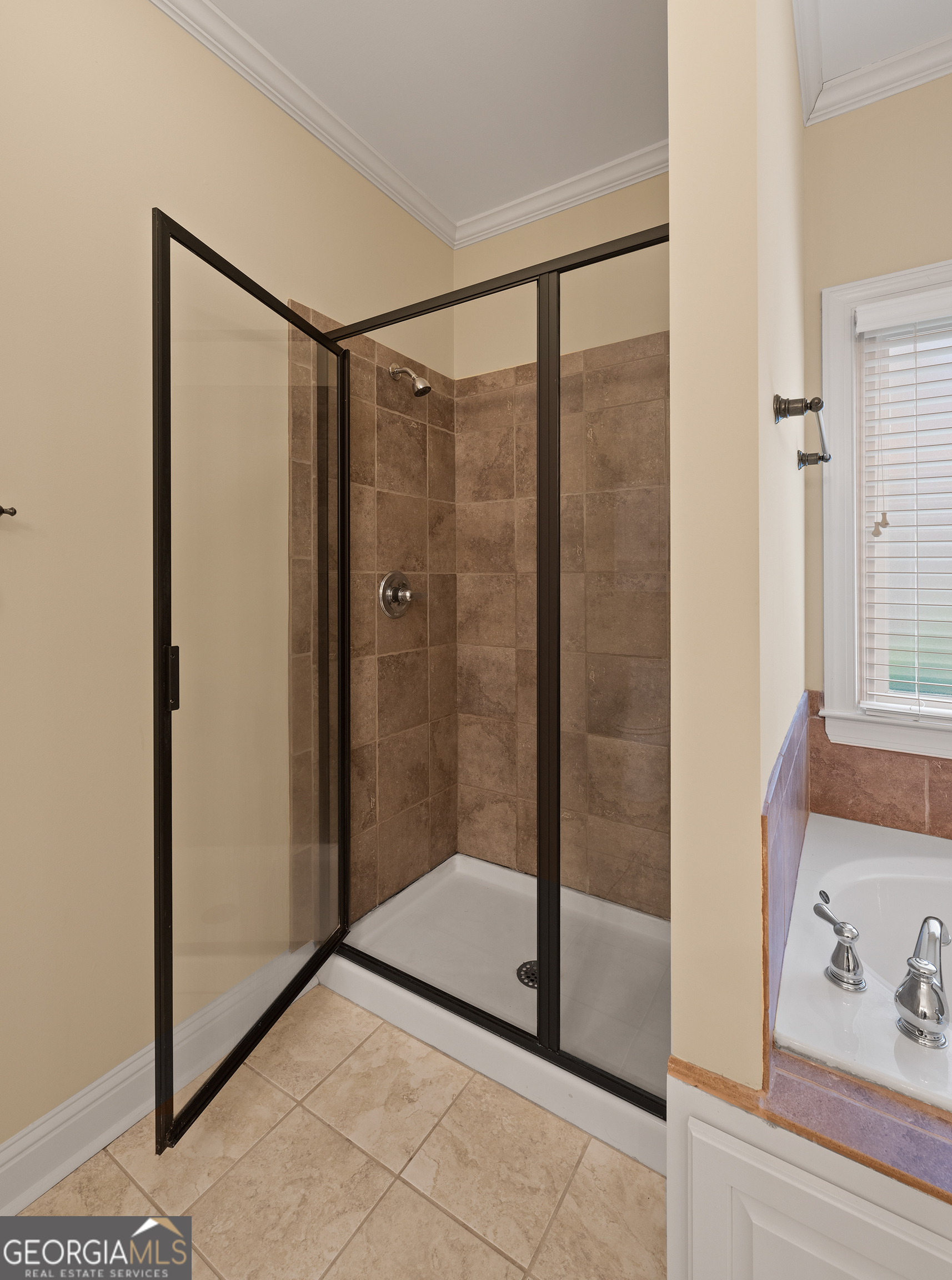 1355 Cold Tree Lane Watkinsville, GA 30677 - Photo 23 of 47 a bathroom with a shower and a sink