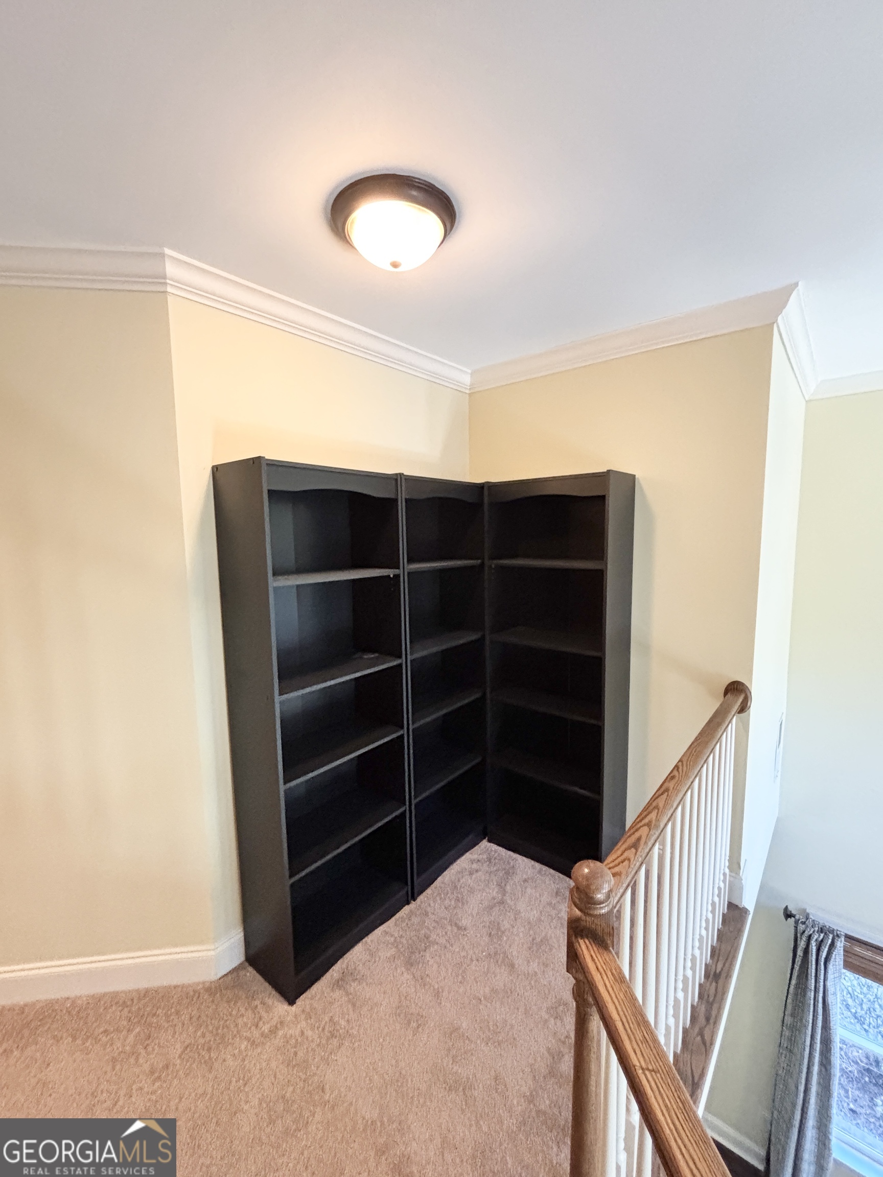 1355 Cold Tree Lane Watkinsville, GA 30677 - Photo 29 of 47 a view of an empty room with a staircase