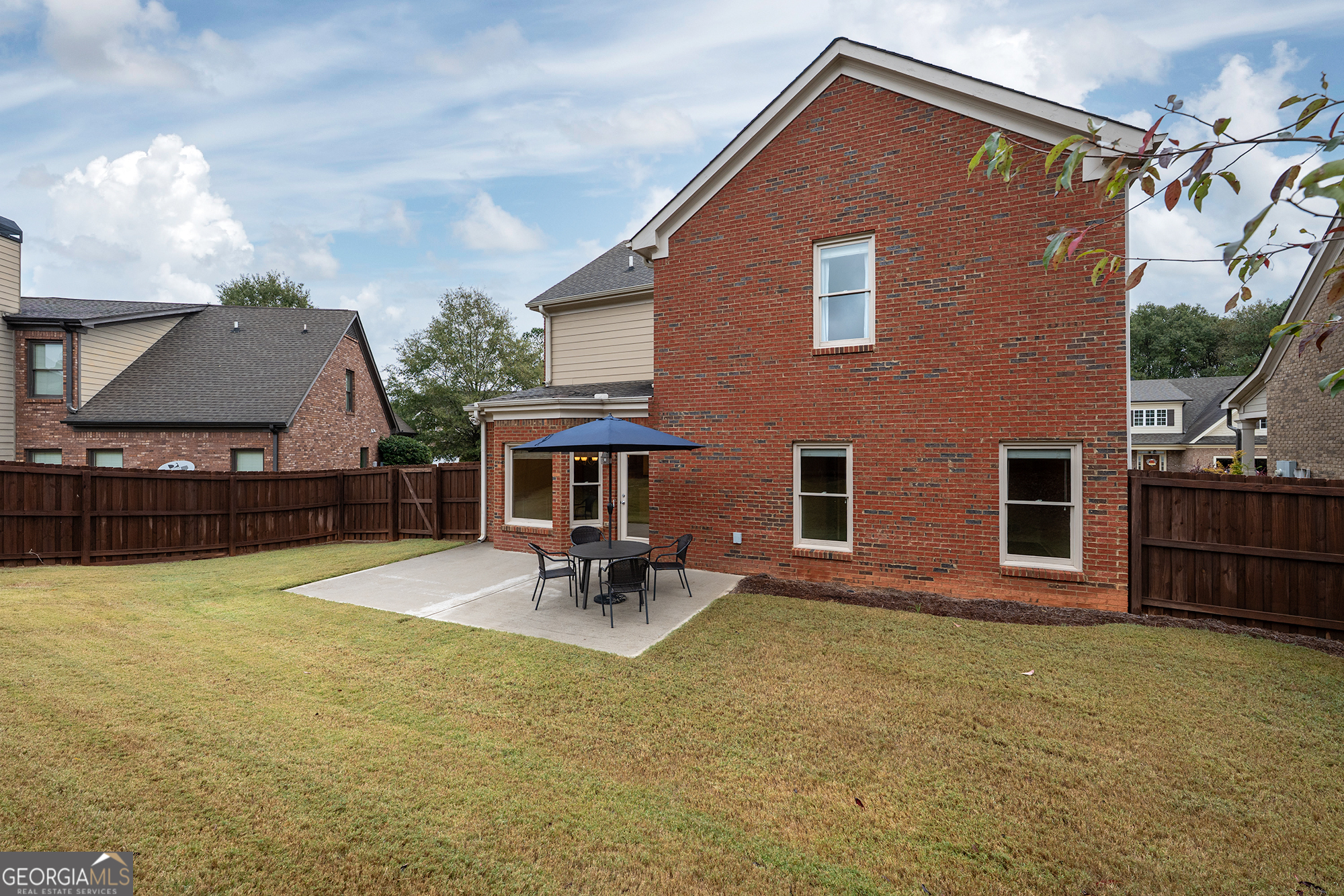 1355 Cold Tree Lane Watkinsville, GA 30677 - Photo 39 of 47 a backyard of a house with table and chairs