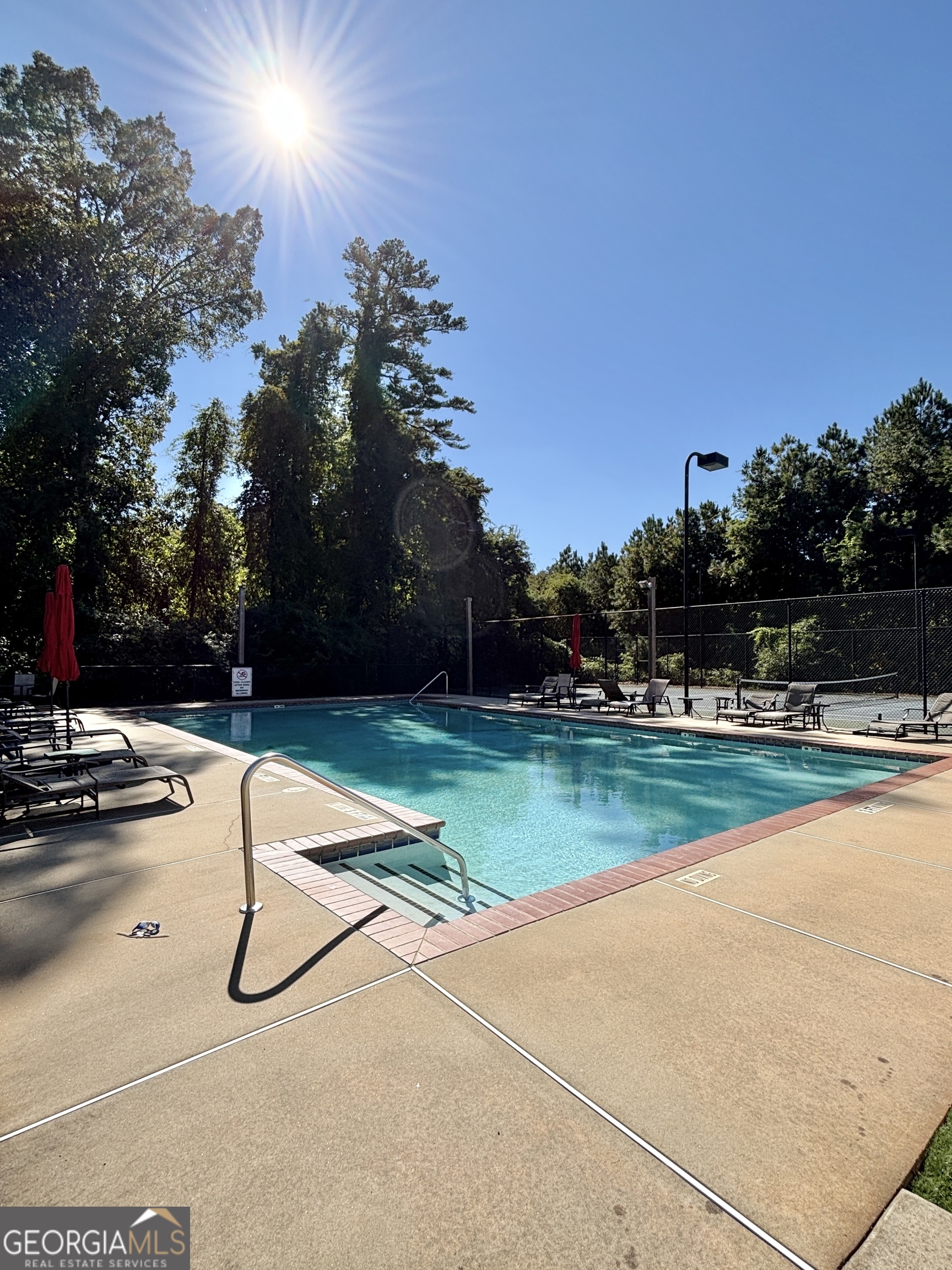1355 Cold Tree Lane Watkinsville, GA 30677 - Photo 45 of 47 a view of swimming pool with outdoor seating and yard in back