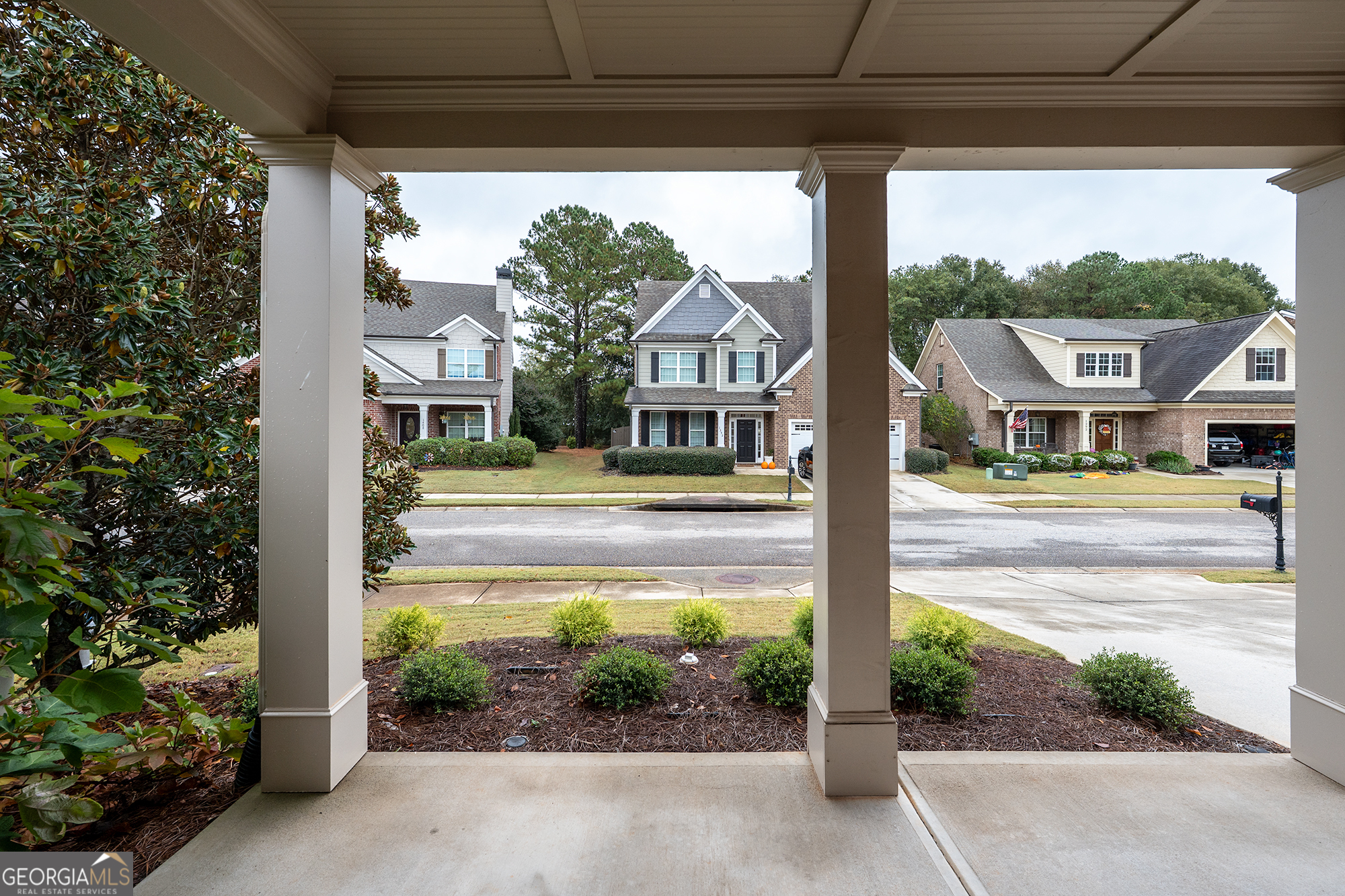 1355 Cold Tree Lane Watkinsville, GA 30677 - Photo 5 of 47 a front view of a house with garden
