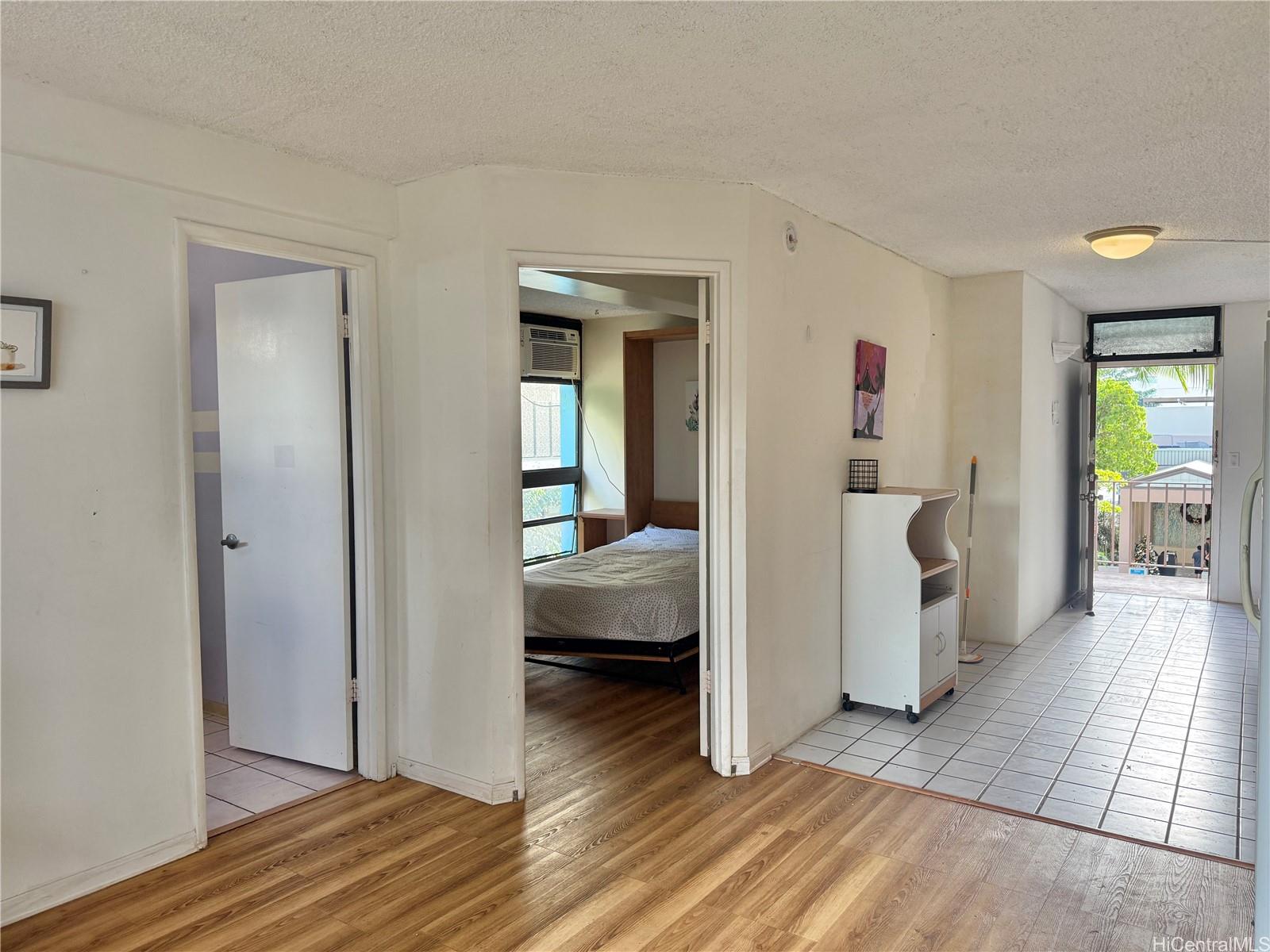 424 Walina Street, Unit 35 Honolulu, HI 96815 - Photo 3 of 15 a view of livingroom with furniture and closet