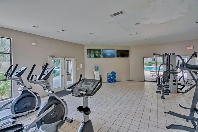 a view of a room with gym equipment