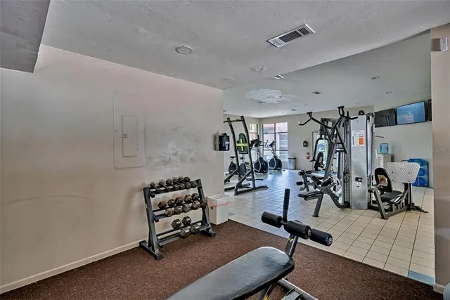 a view of a room with gym equipment
