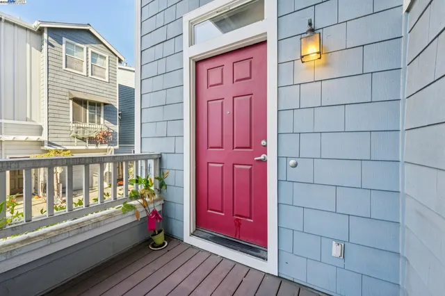 a balcony with wooden floor