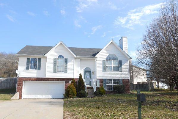 2710 Double Tree Way Spring Hill, TN 37174 - Photo 2 of 17 a front view of a house with a yard