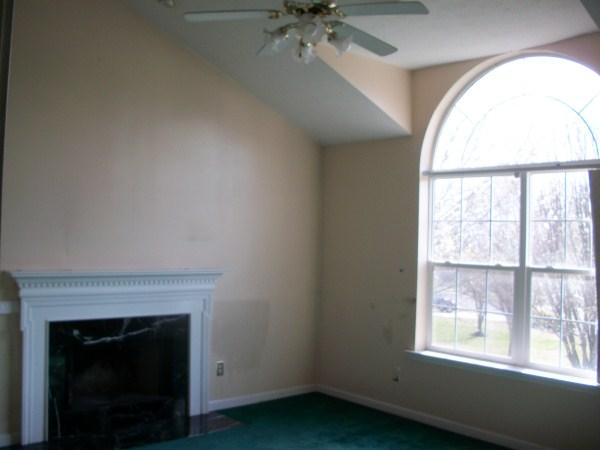 2710 Double Tree Way Spring Hill, TN 37174 - Photo 5 of 17 an empty room with a fireplace