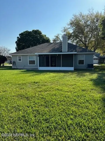 a view of outdoor space and yard