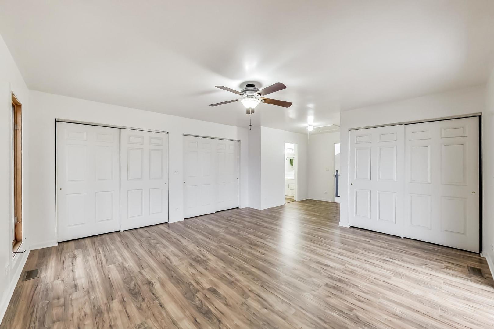 4000 Ridge Road Zion, IL 60099 - Photo 21 of 47 a view of an empty room with wooden floor
