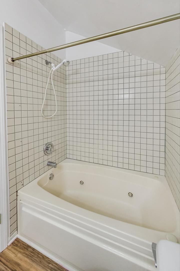 4000 Ridge Road Zion, IL 60099 - Photo 26 of 47 a bathroom with a bathtub and shower