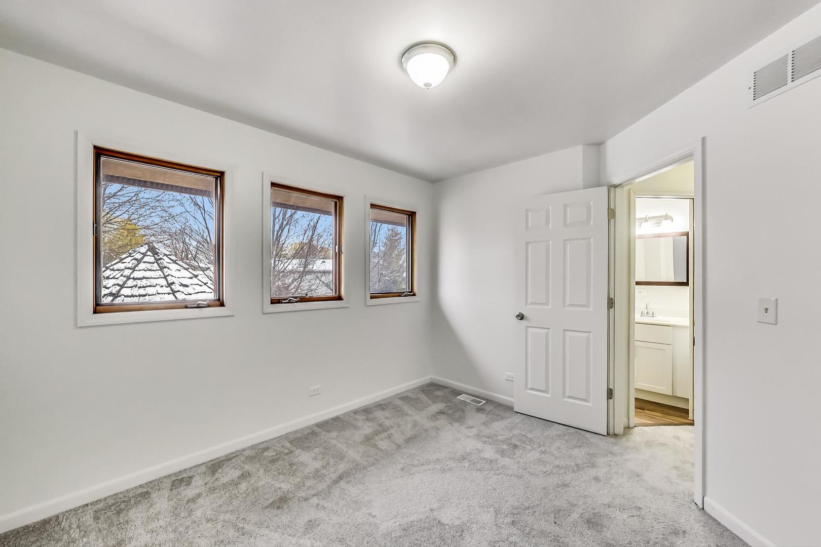 4000 Ridge Road Zion, IL 60099 - Photo 34 of 47 an empty room with windows and closet