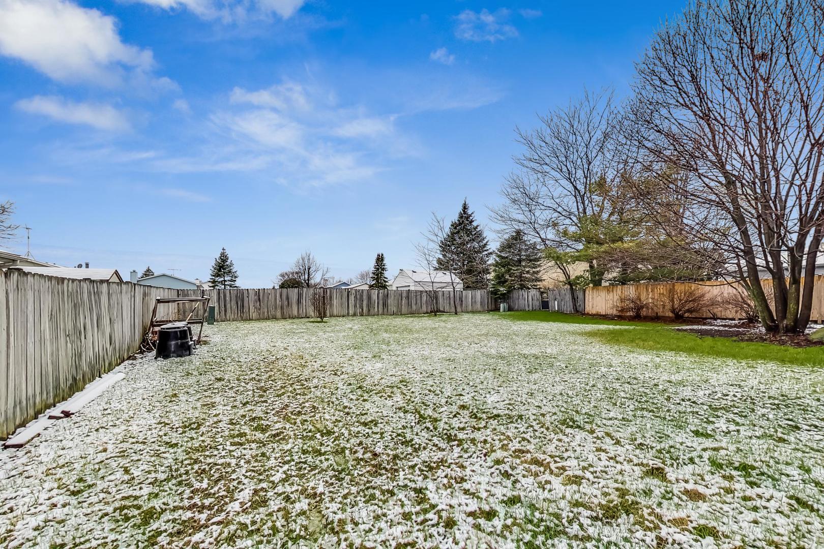 4000 Ridge Road Zion, IL 60099 - Photo 41 of 47 a view of a yard with a house