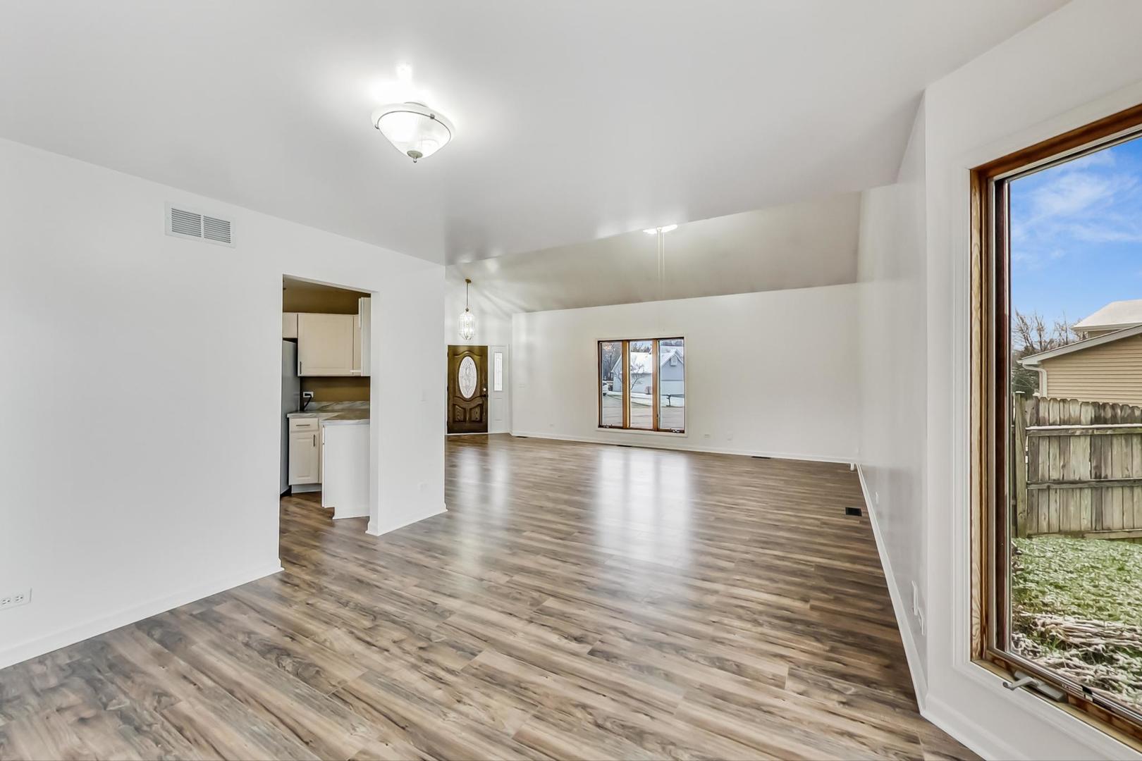 4000 Ridge Road Zion, IL 60099 - Photo 8 of 47 a view of a room with wooden floor and a window