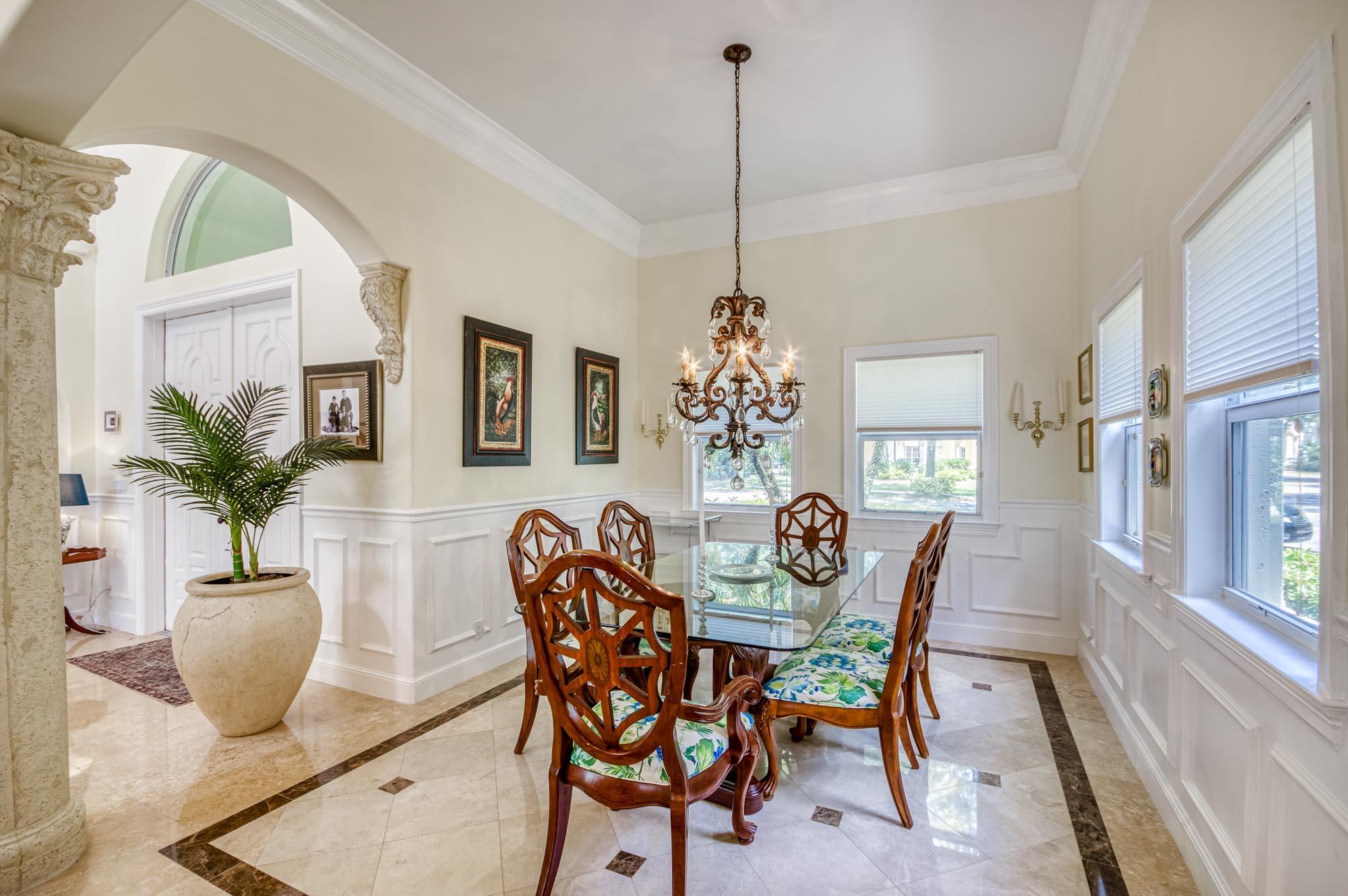 412 Meadowlark Drive Jupiter, FL 33458 - Photo 12 of 40 a view of a dining room with furniture and window