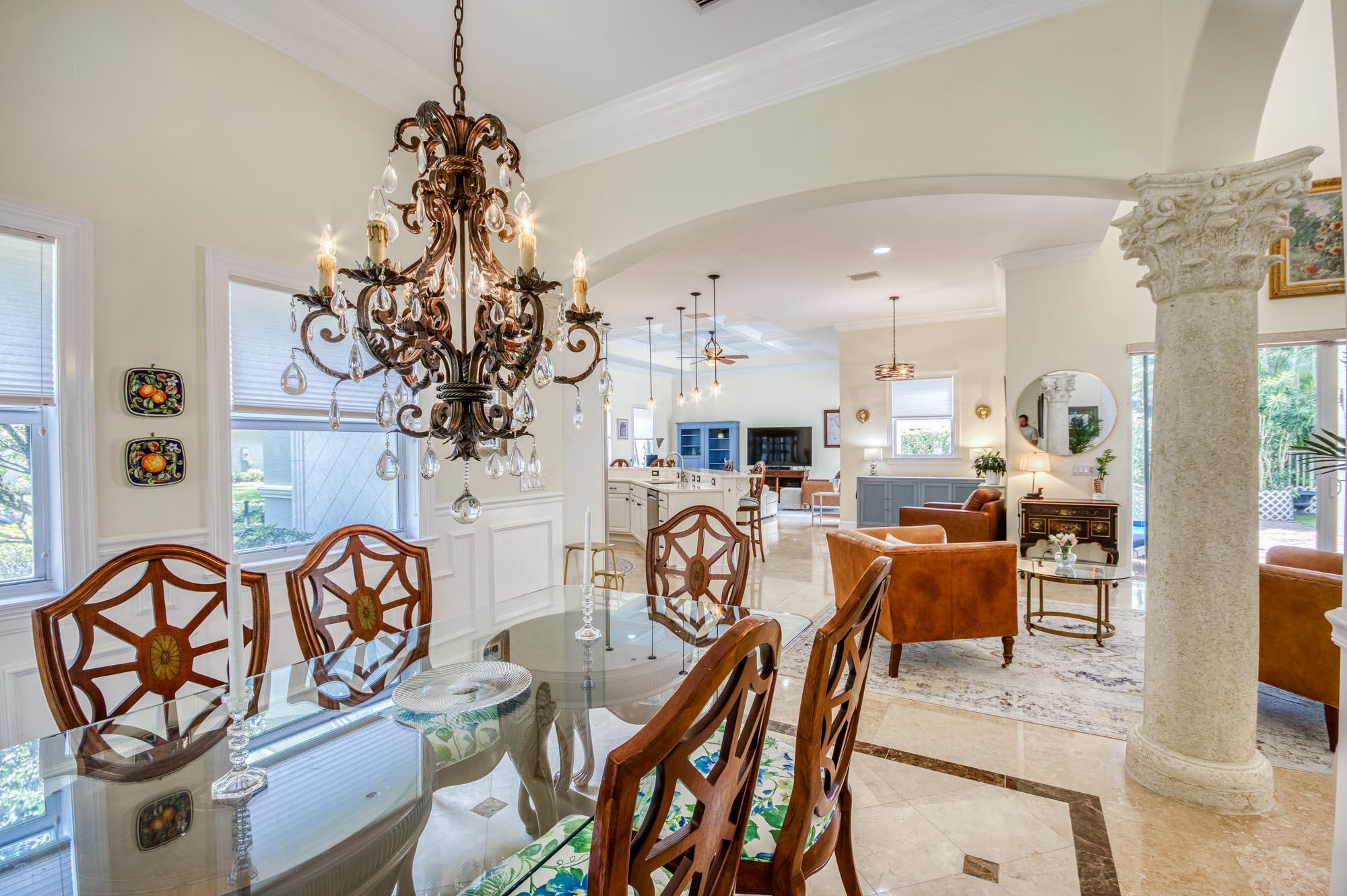 412 Meadowlark Drive Jupiter, FL 33458 - Photo 13 of 40 a view of a dining room with furniture