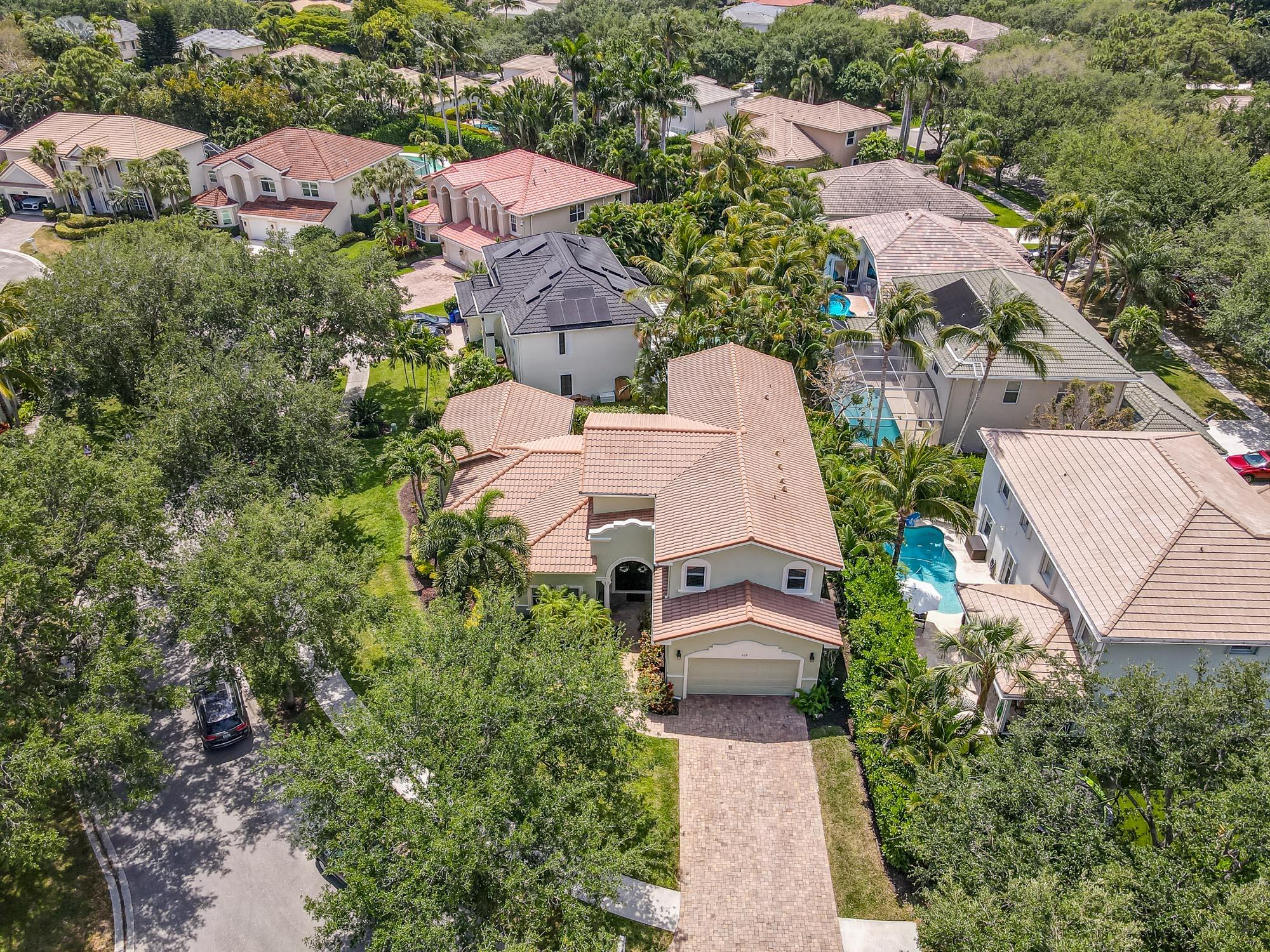 412 Meadowlark Drive Jupiter, FL 33458 - Photo 31 of 40 an aerial view of a houses with yard