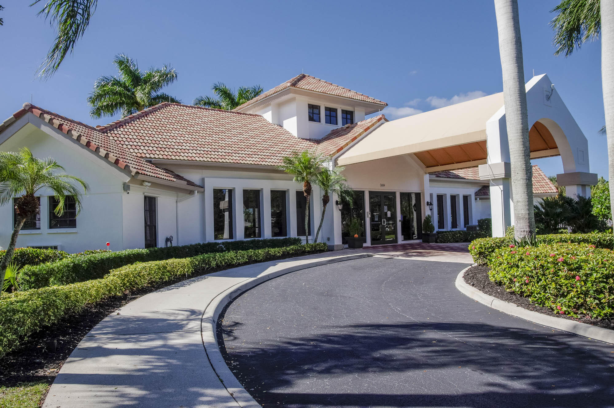 412 Meadowlark Drive Jupiter, FL 33458 - Photo 33 of 40 a front view of a house with garden