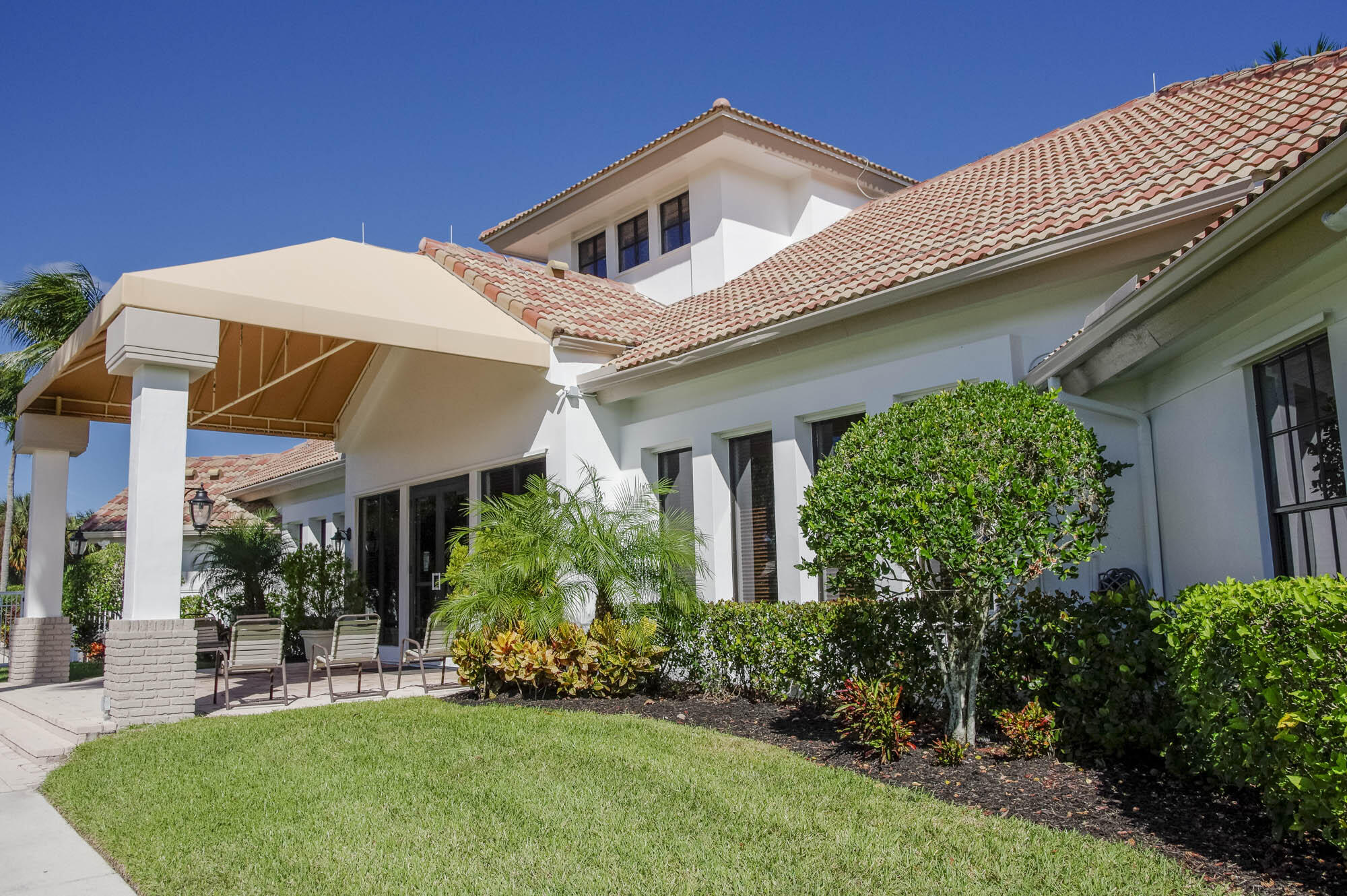 412 Meadowlark Drive Jupiter, FL 33458 - Photo 34 of 40 a front view of a house with a yard