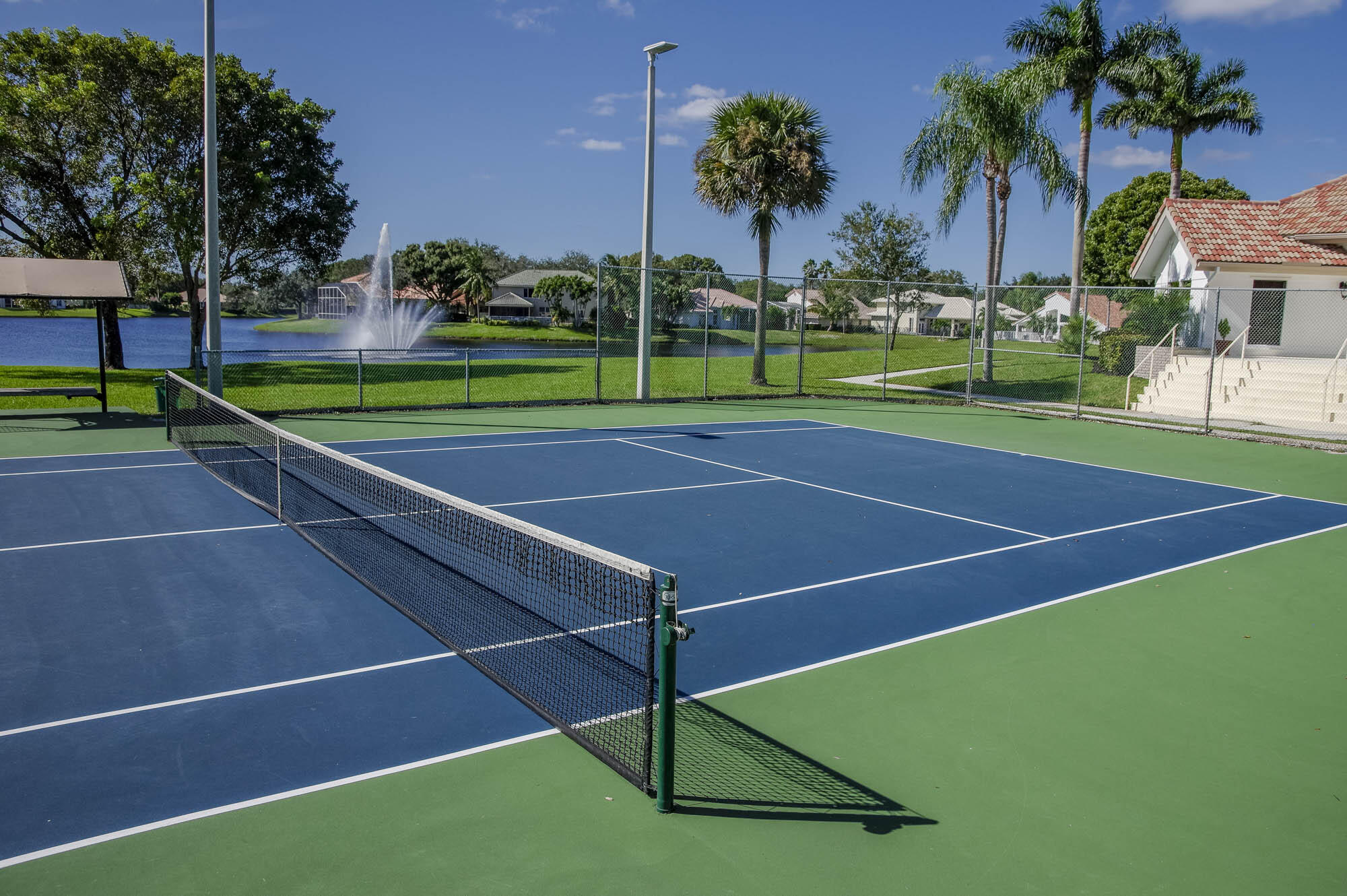 412 Meadowlark Drive Jupiter, FL 33458 - Photo 36 of 40 a view of a tennis court