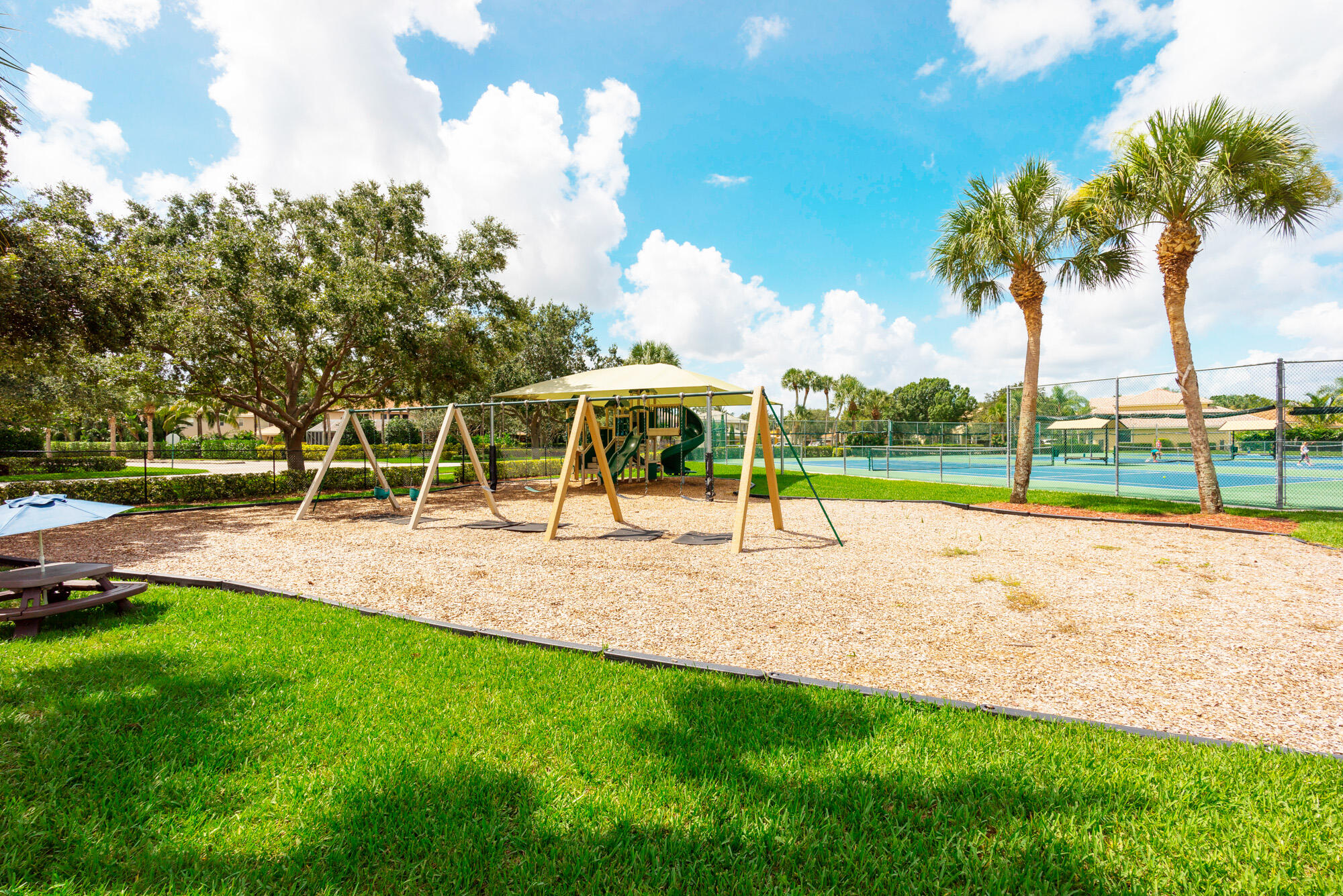 412 Meadowlark Drive Jupiter, FL 33458 - Photo 38 of 40 a view of a park with slide