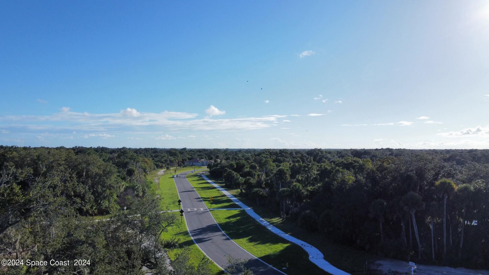 7904 Risen Star Place Melbourne, FL 32940 - Photo 6 of 9 a view of yard with ocean view
