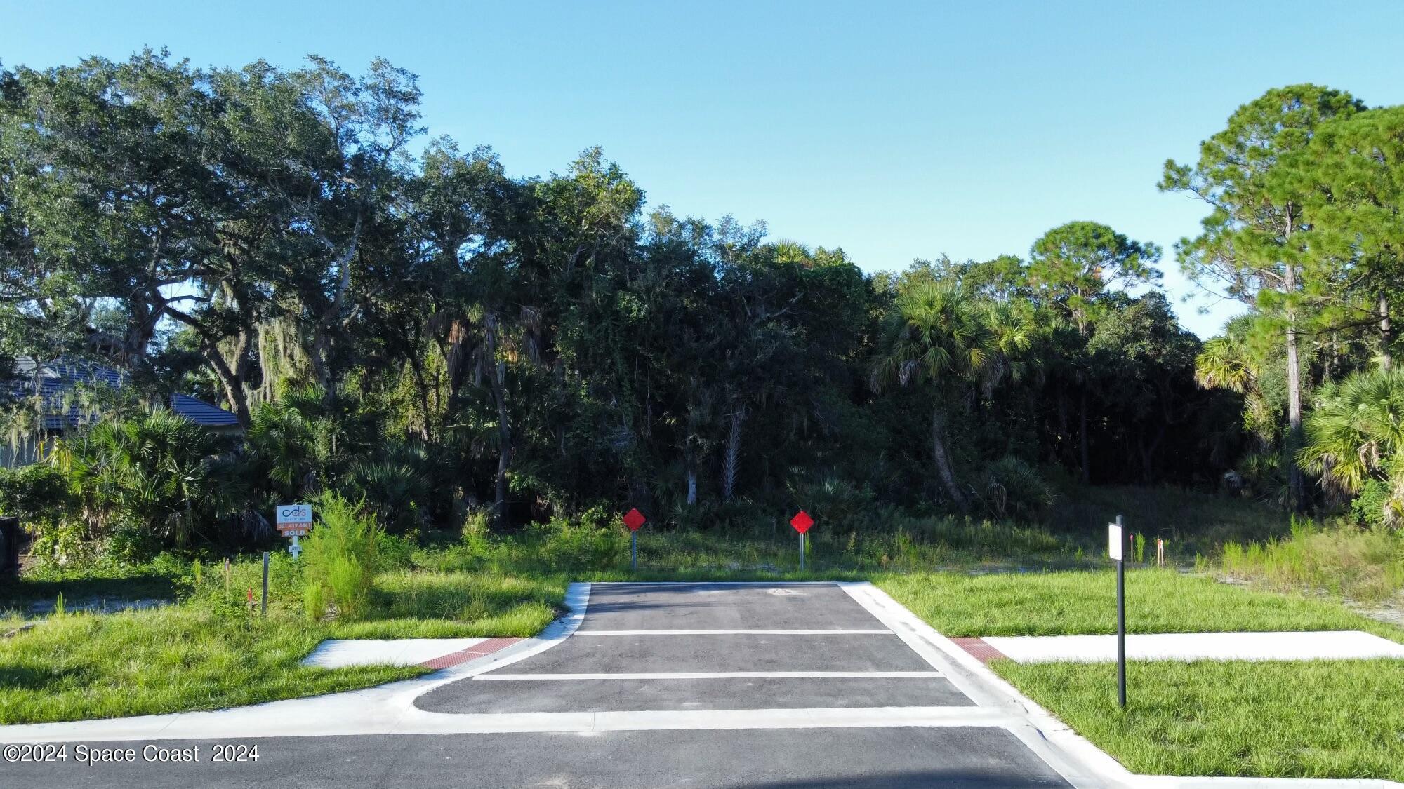 7904 Risen Star Place Melbourne, FL 32940 - Photo 8 of 9 a view of park with tree s