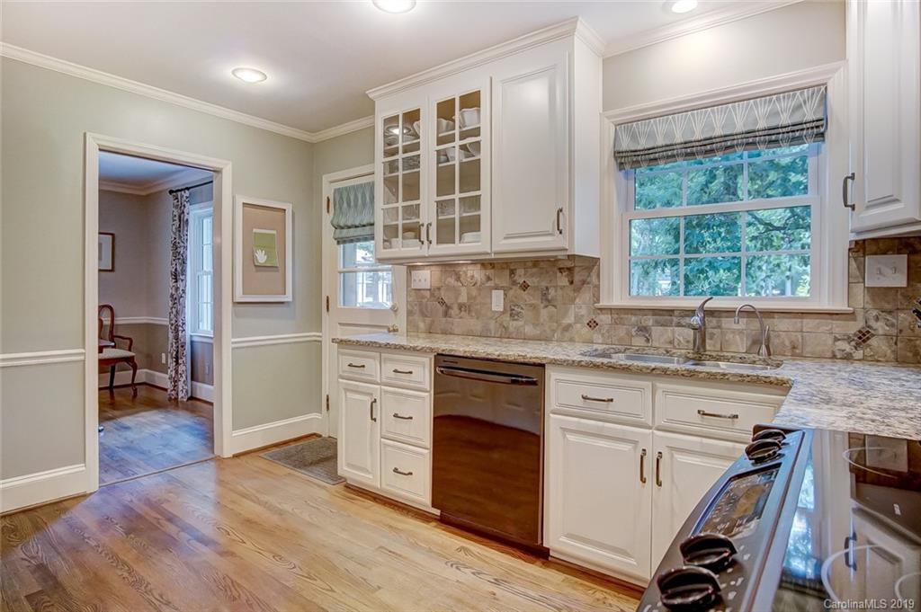 426 Ellsworth Road Charlotte, NC 28211 - Photo 14 of 30 a kitchen with cabinets appliances and a window