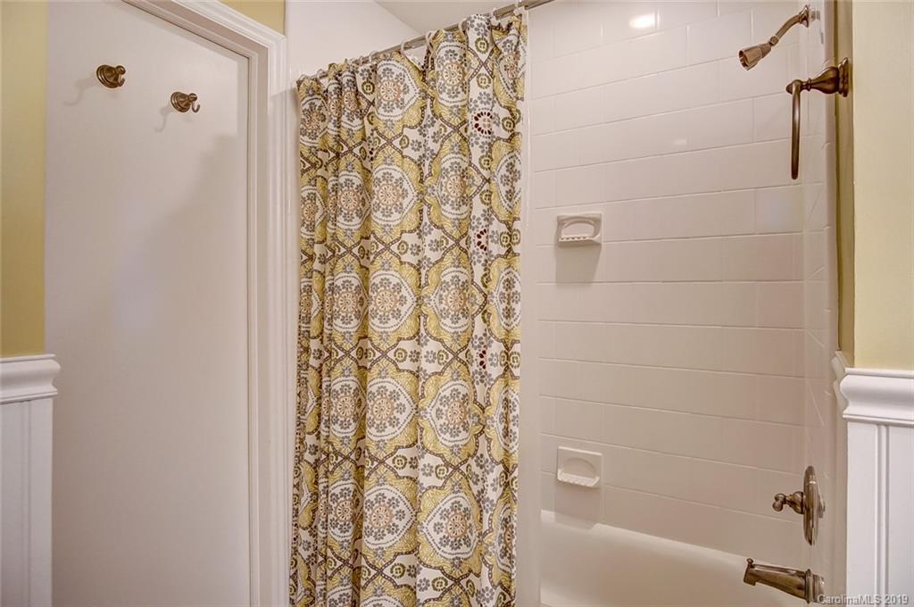 426 Ellsworth Road Charlotte, NC 28211 - Photo 22 of 30 a bathroom with a bathtub and shower