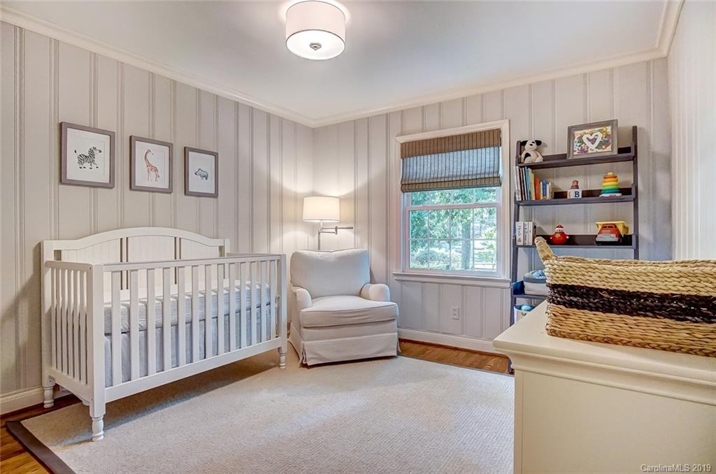 426 Ellsworth Road Charlotte, NC 28211 - Photo 23 of 30 a bedroom with a bed and a window