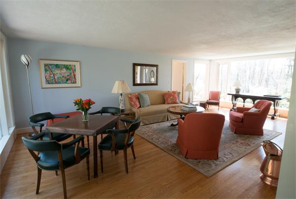 15 West Knoll Road Andover, MA 01810 - Photo 4 of 15 a living room with furniture a table and a window