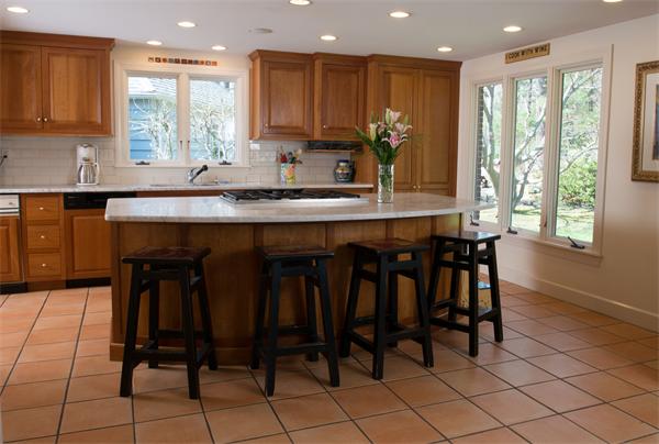 15 West Knoll Road Andover, MA 01810 - Photo 8 of 15 a kitchen with stainless steel appliances granite countertop a stove a sink and a microwave