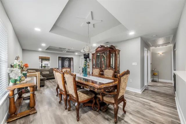 a kitchen with a sink stove and refrigerator
