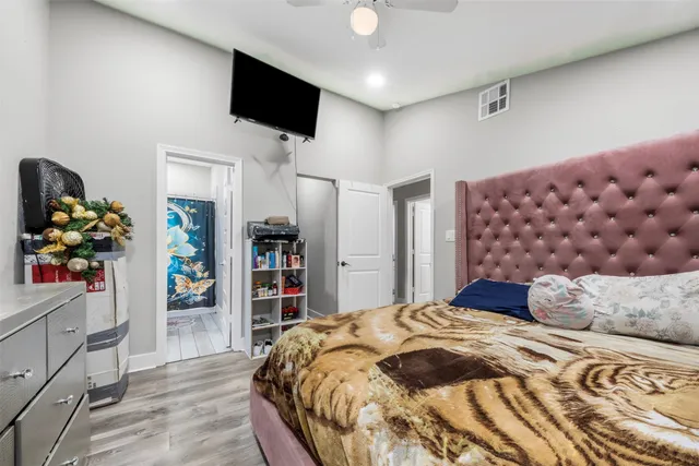 a view of an house with backyard space and garden