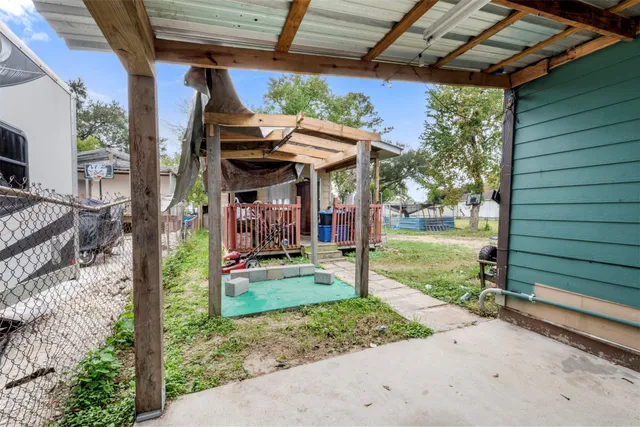 an aerial view of residential house with outdoor space