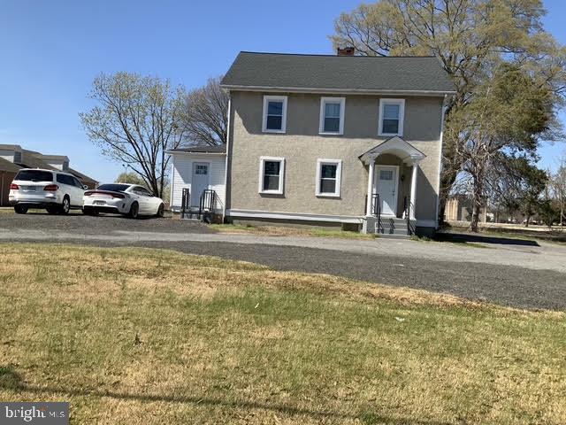3025 Old Washington Road Waldorf, MD 20601 - Photo 2 of 7 a front view of a house with a yard