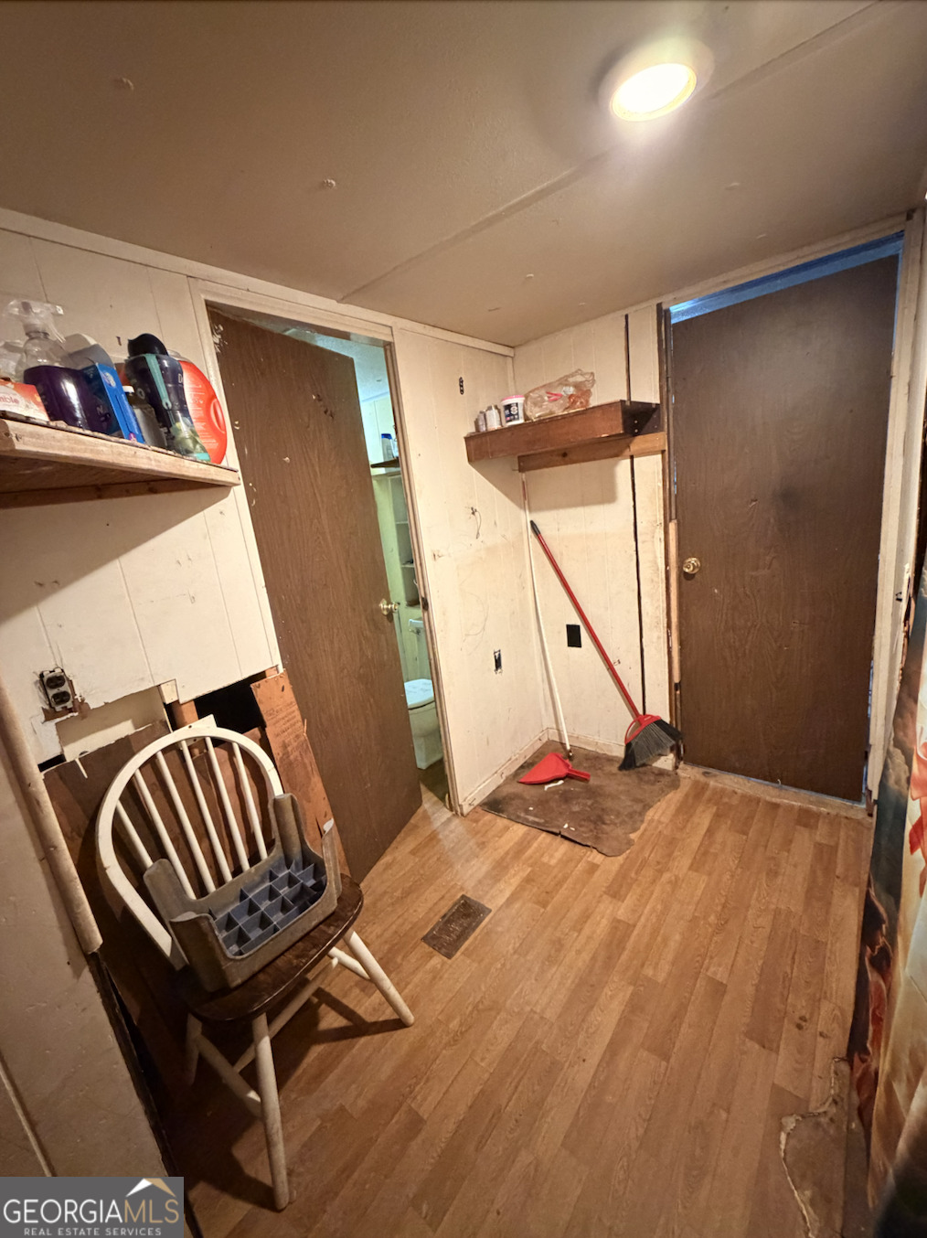258 Persimmon Street Toccoa, GA 30577 - Photo 12 of 25 a view of an empty room with wooden floor