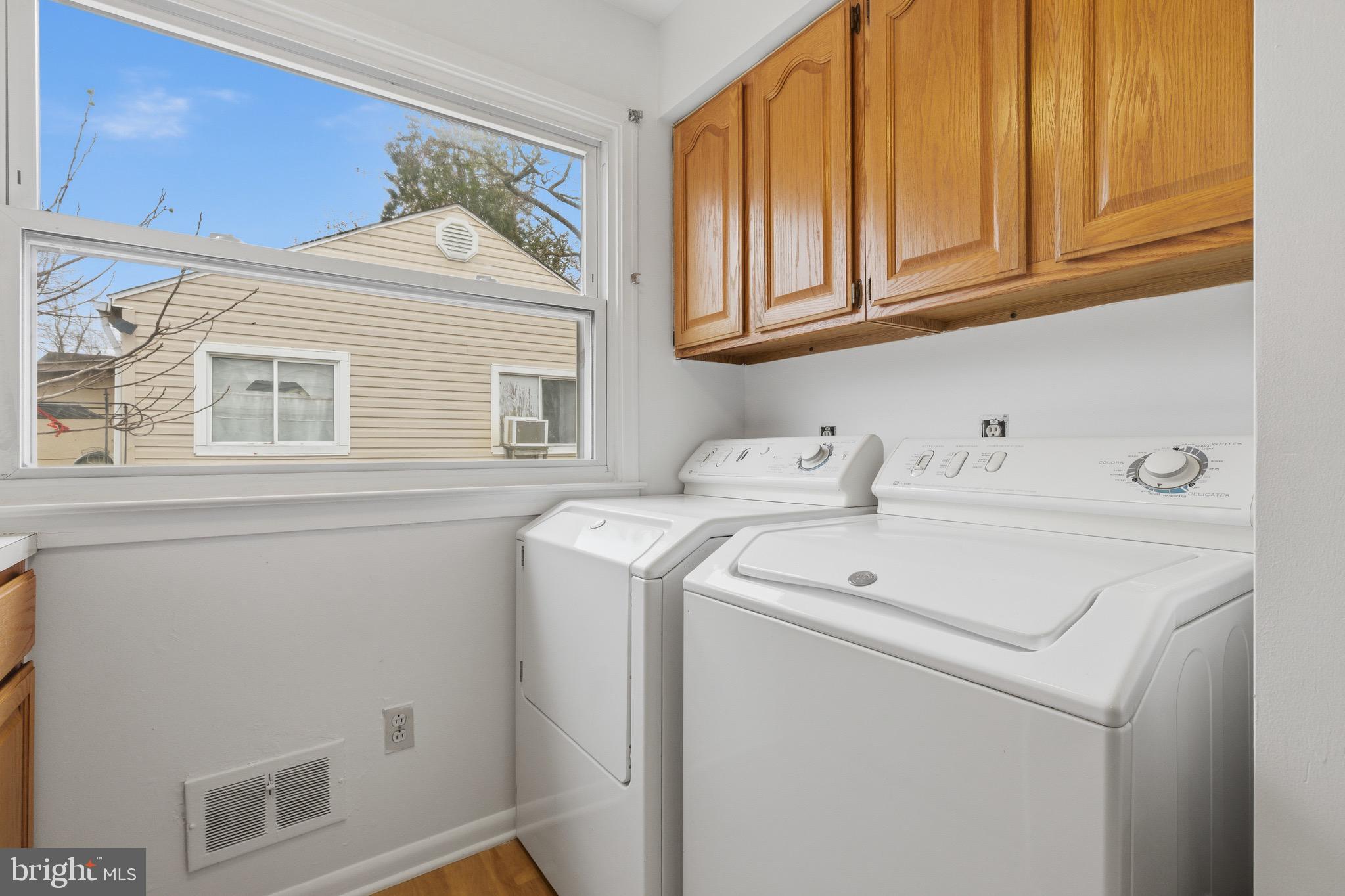 1004 Marton Street Laurel, MD 20707 - Photo 15 of 24 a utility room with dryer and washer